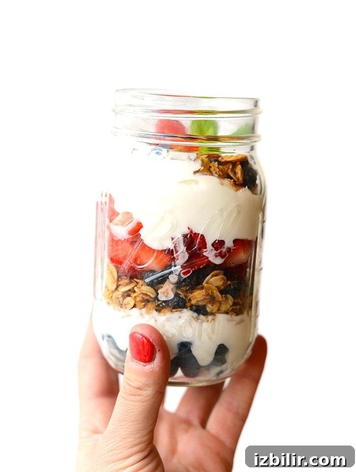  Layer up Greek yogurt, fresh berries, and your favorite homemade granola for the simplest mason jar parfait breakfast!