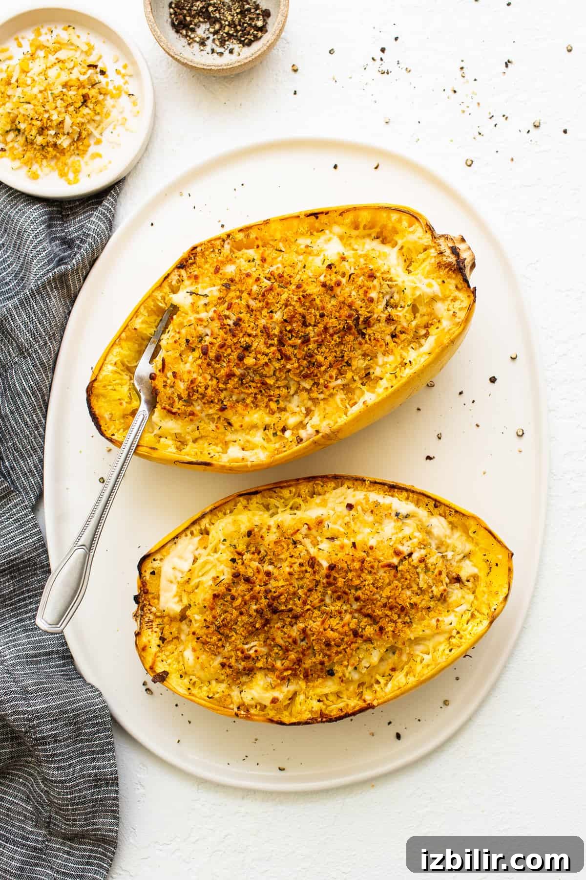 Finished spaghetti squash mac and cheese Spaghetti squash mac and cheese topped with breadcrumbs.