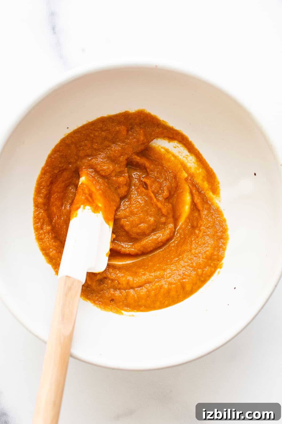 Pumpkin mixture for French toast Pumpkin filling in a bowl.