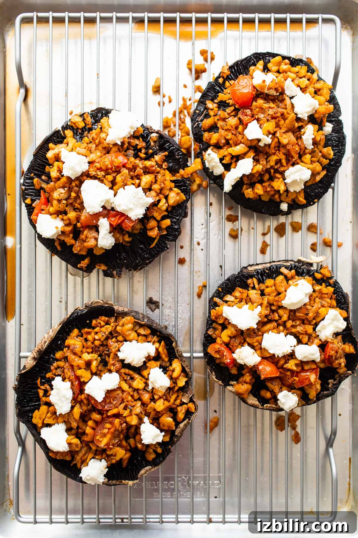 Stuffed portobello mushrooms with goat cheese on top.