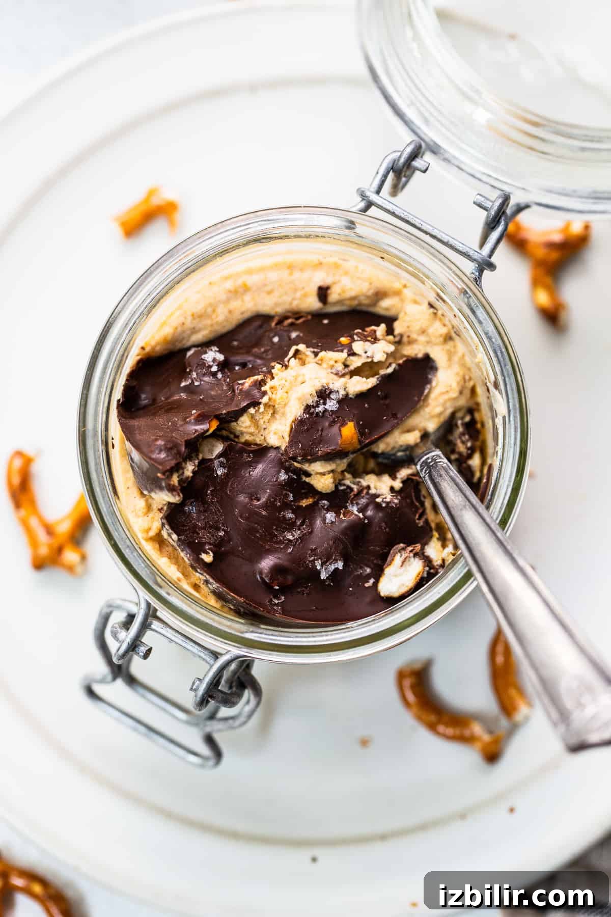 Pumpkin mousse in a jar topped with chocolate topping.