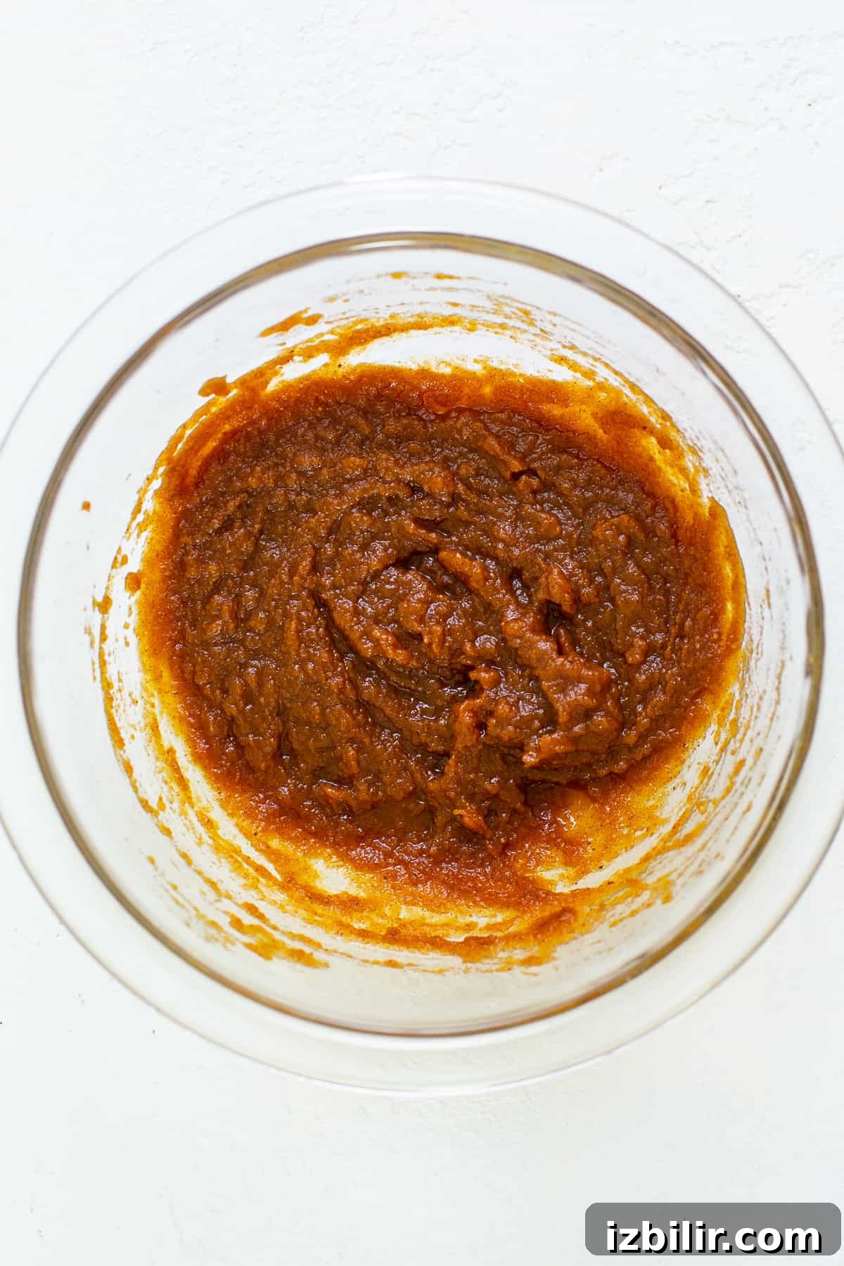 Pumpkin mixture for pumpkin mousse in a bowl.