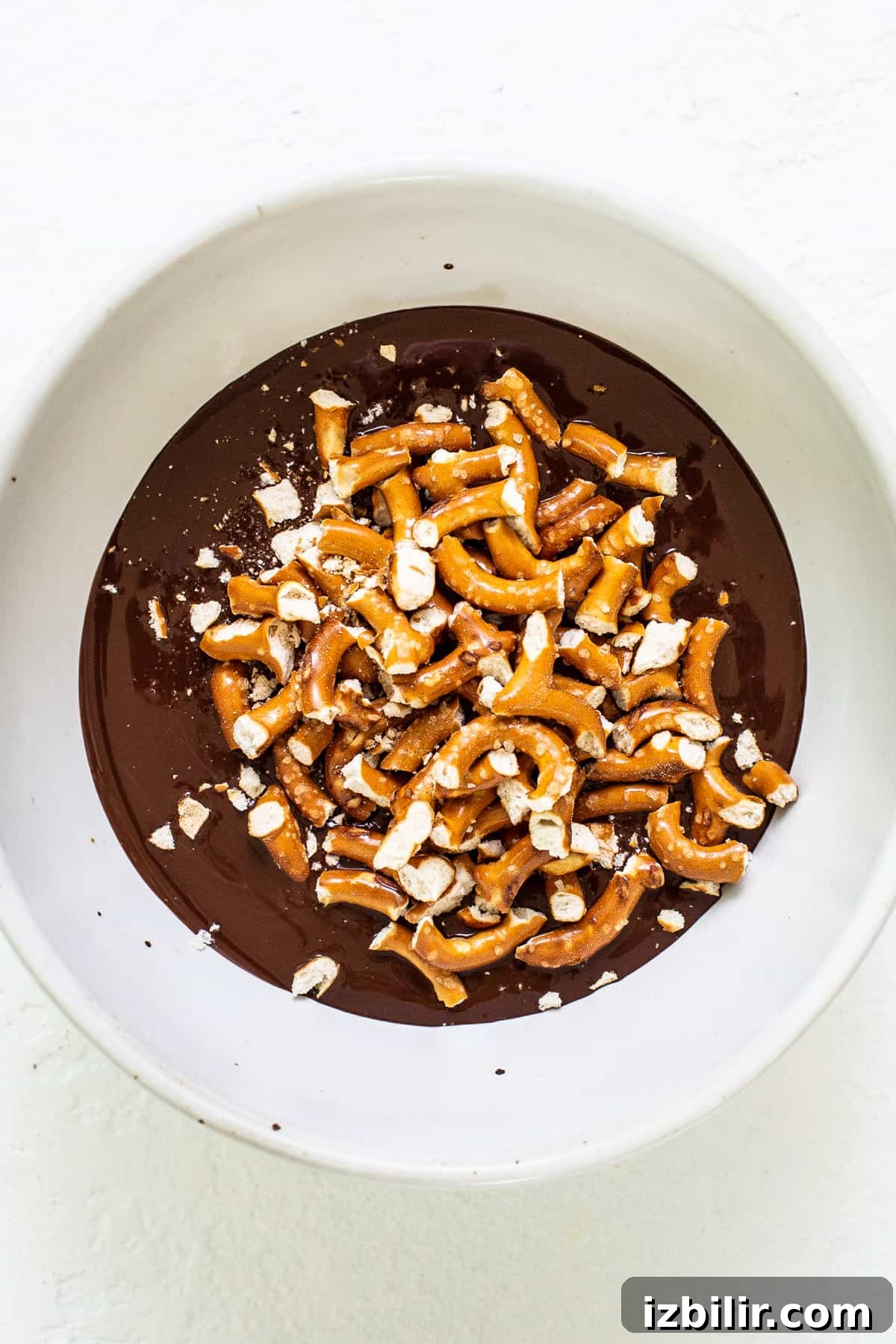 Chocolate pretzel topping in a bowl.