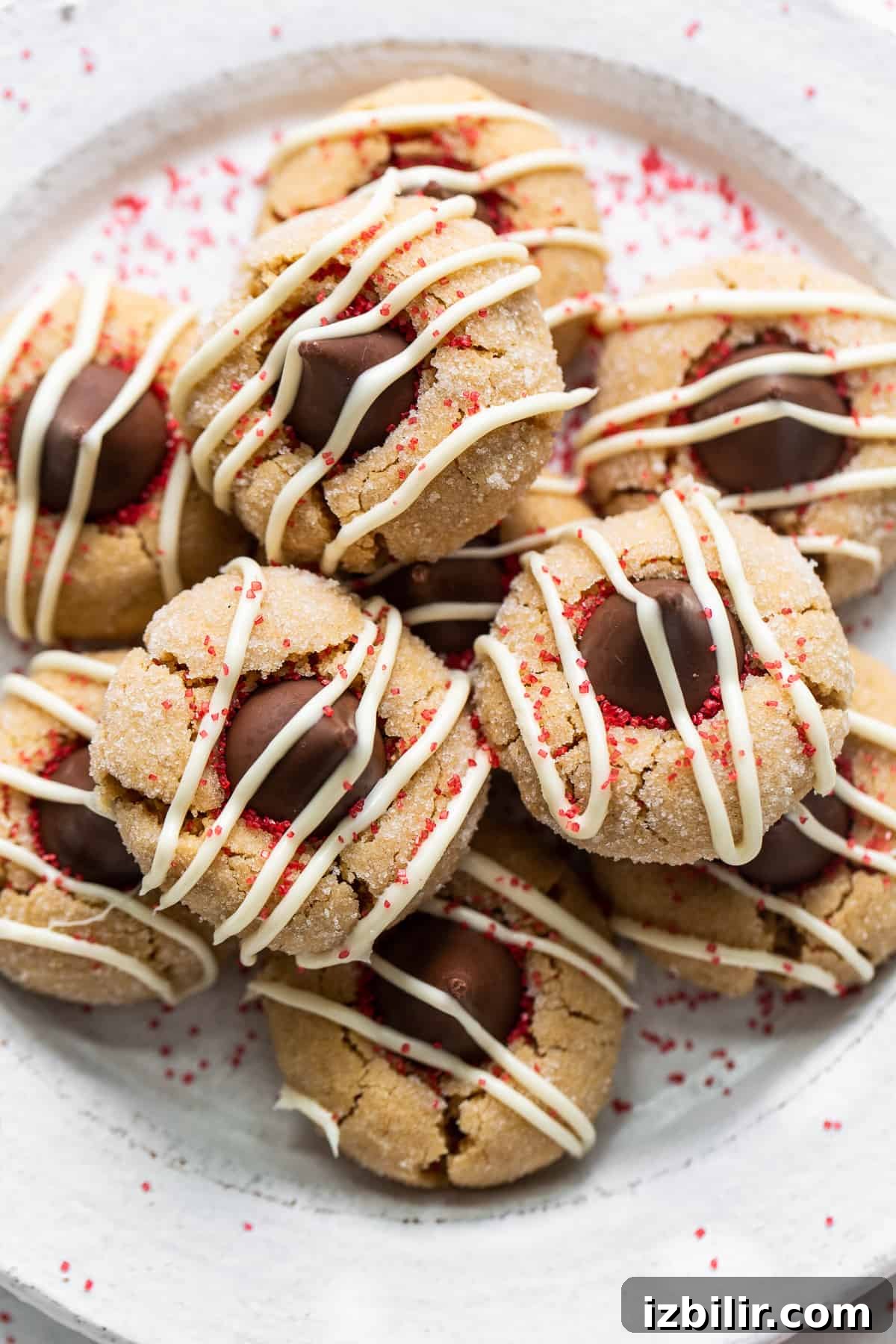 Peanut butter kiss cookies on a plate.