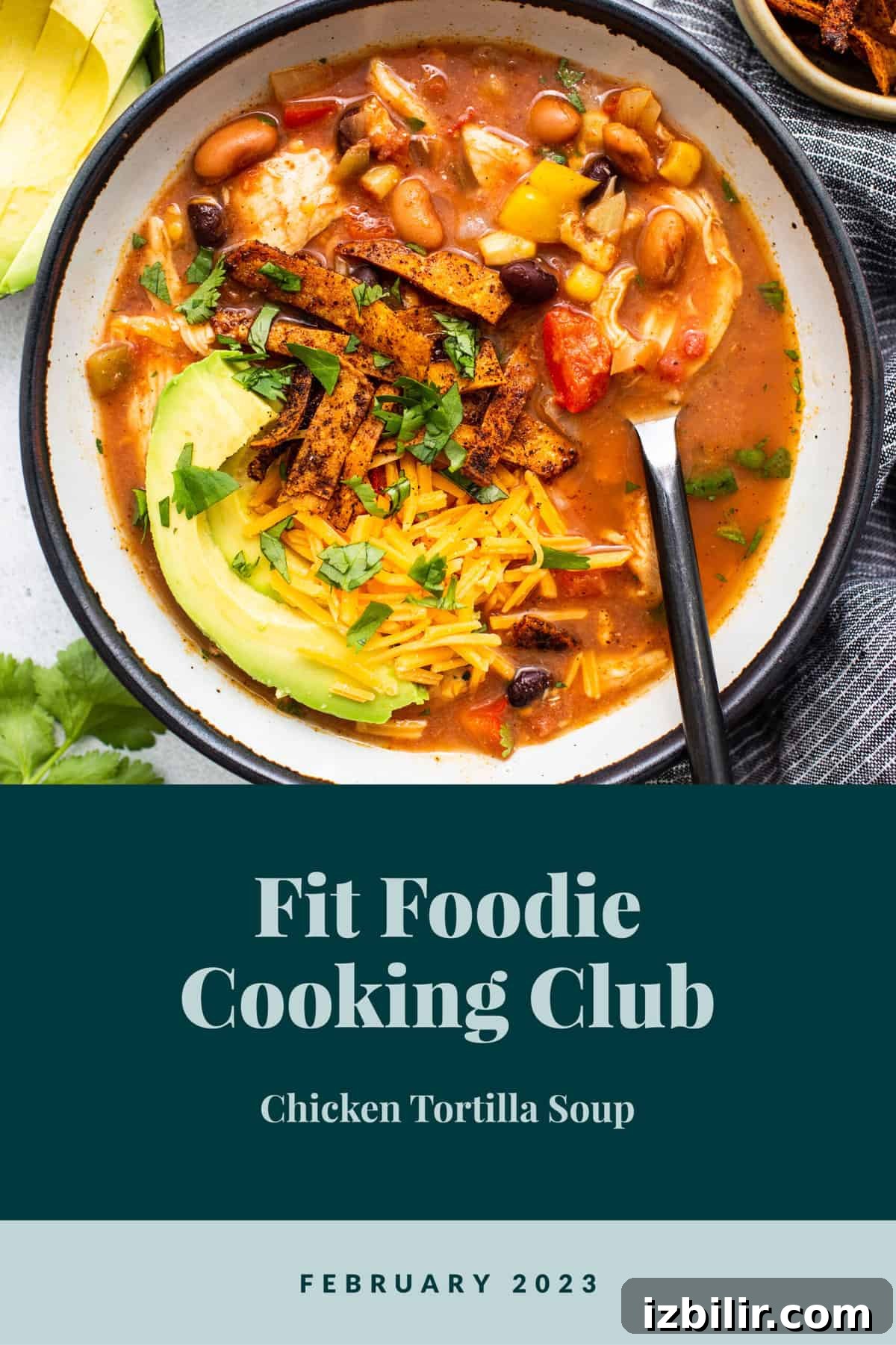 Slow cooker chicken tortilla soup from Fit Foodie Cooking Club – February 2023. Chicken tortilla soup in a bowl.