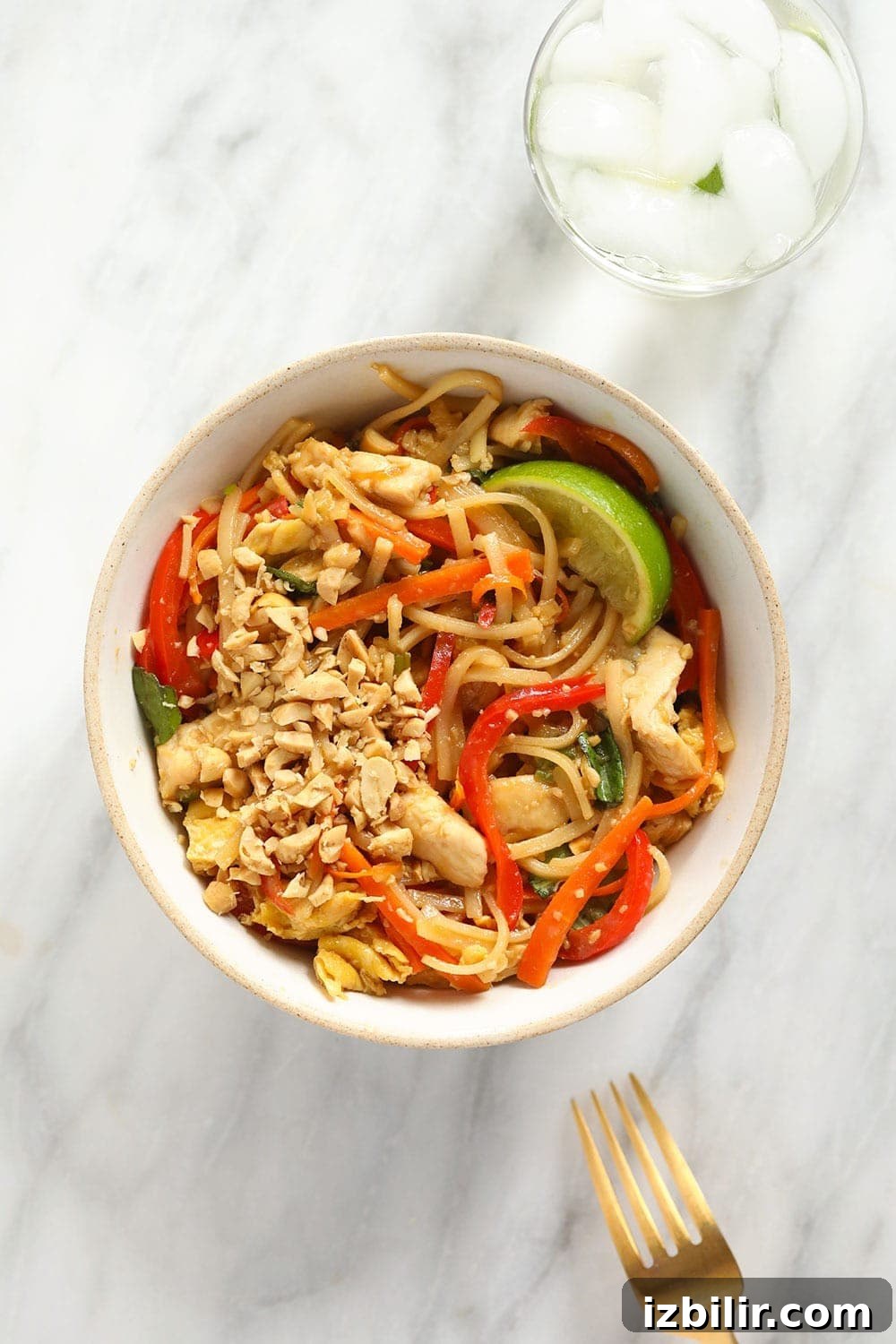 Chicken pad Thai in a single serve bowl ready to eat.