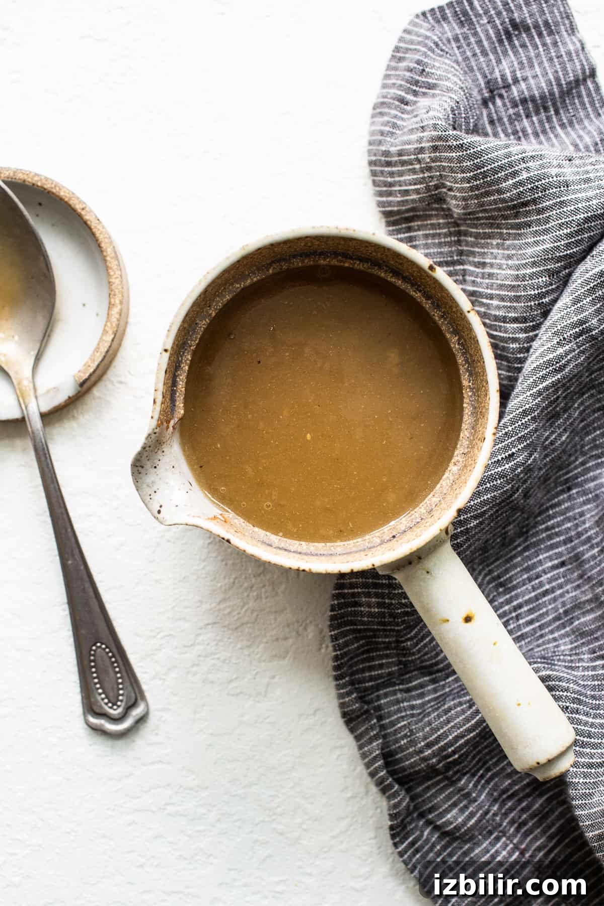 Turkey gravy in a gravy boat. Turkey gravy in a gravy boat.