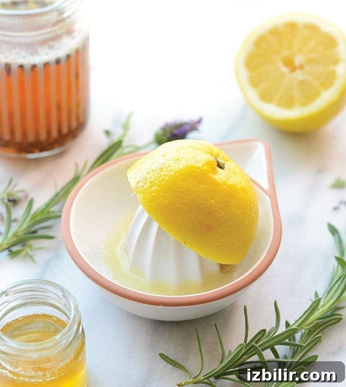 lemon on juicer with honey
