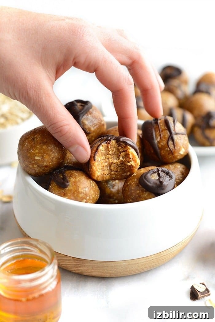 Grabbing a peanut butter energy ball