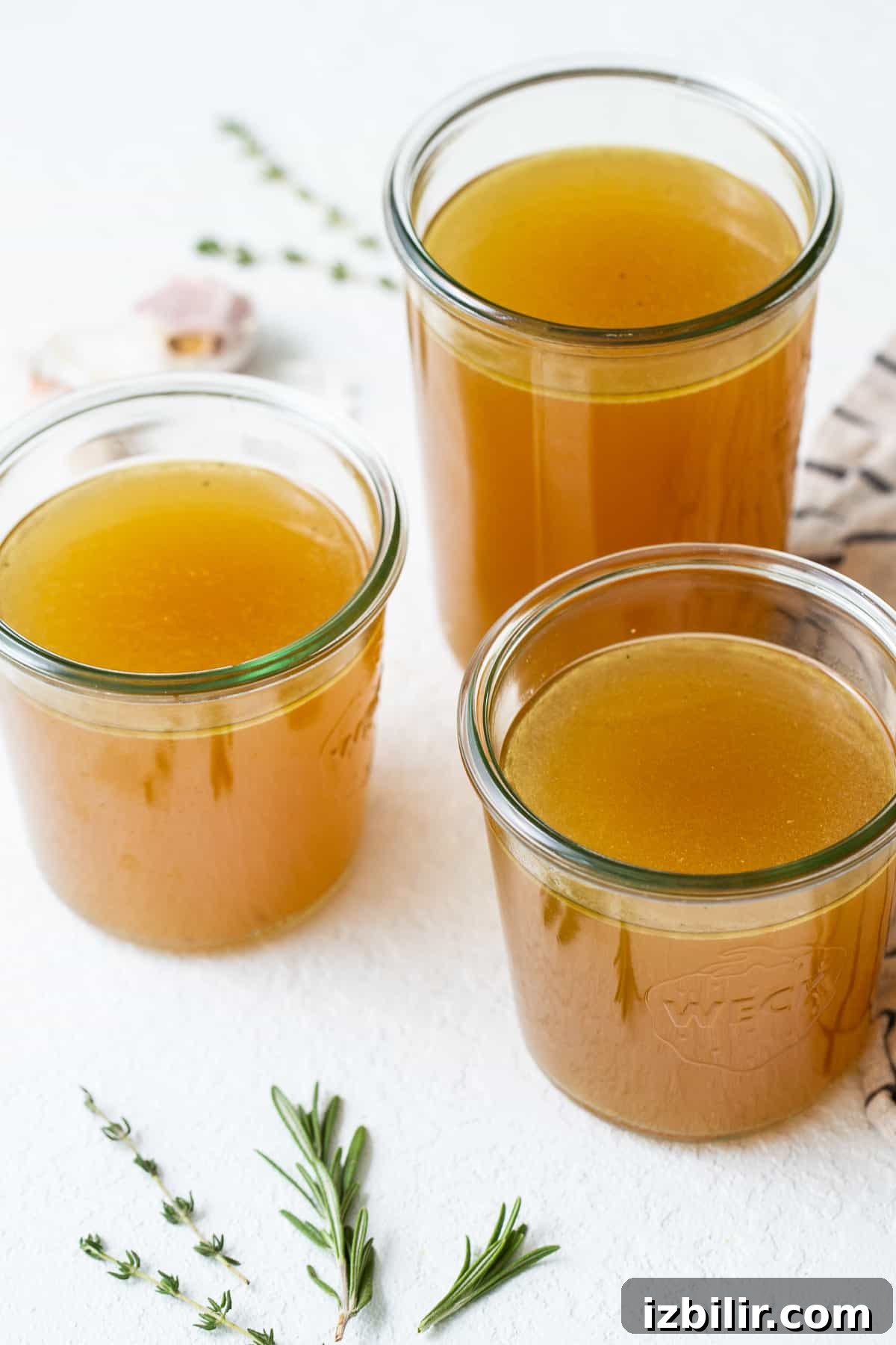 Rich Homemade Turkey Stock for Soups and Gravies 2 Turkey stock in jars.