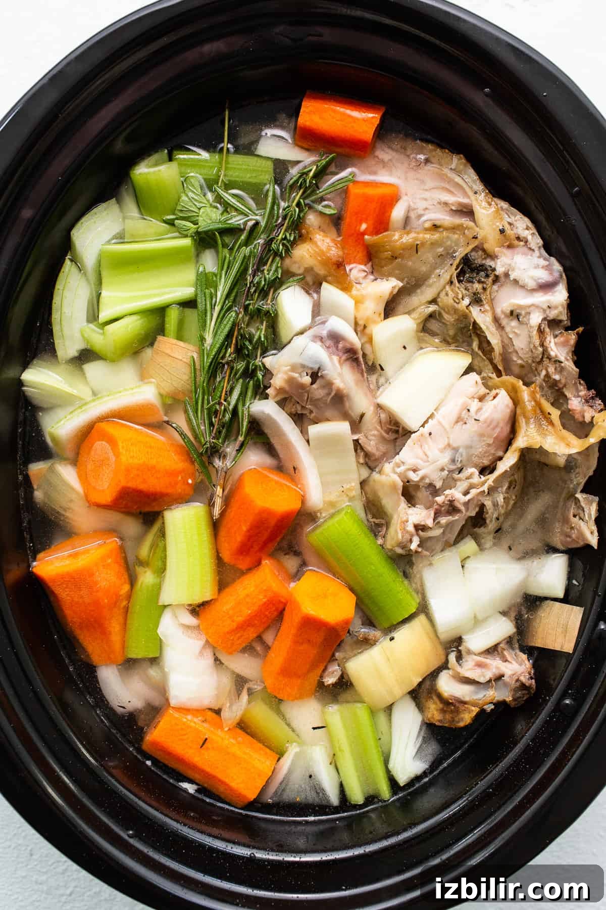 Rich Homemade Turkey Stock for Soups and Gravies 5 Turkey stock ingredients in a slow cooker.