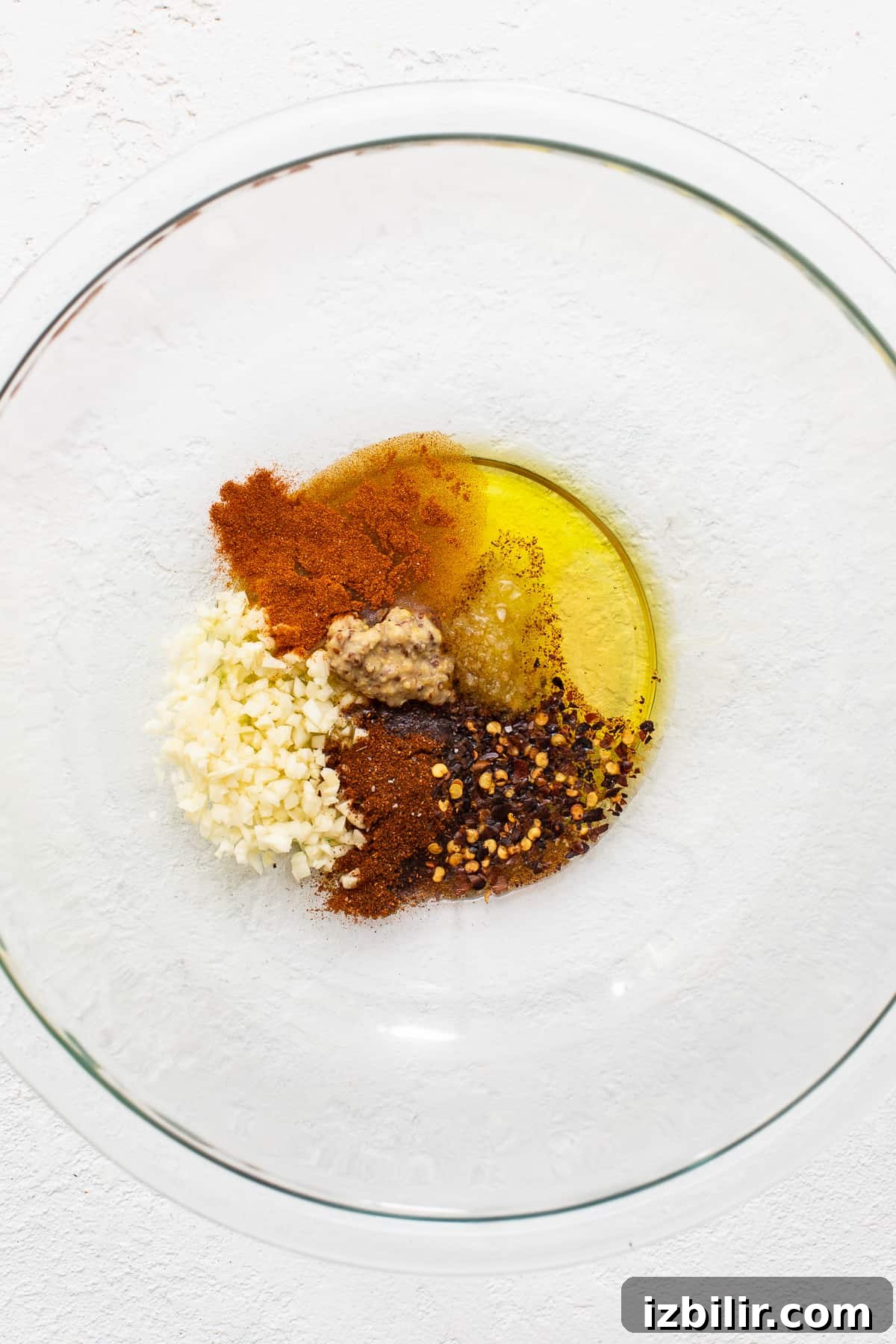Shrimp marinade ingredients in a bowl.