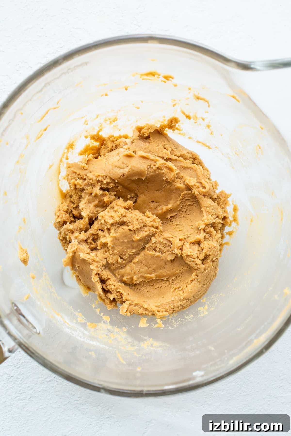 Peanut butter kiss cookie dough in a bowl. Peanut butter kiss cookies dough in a bowl.