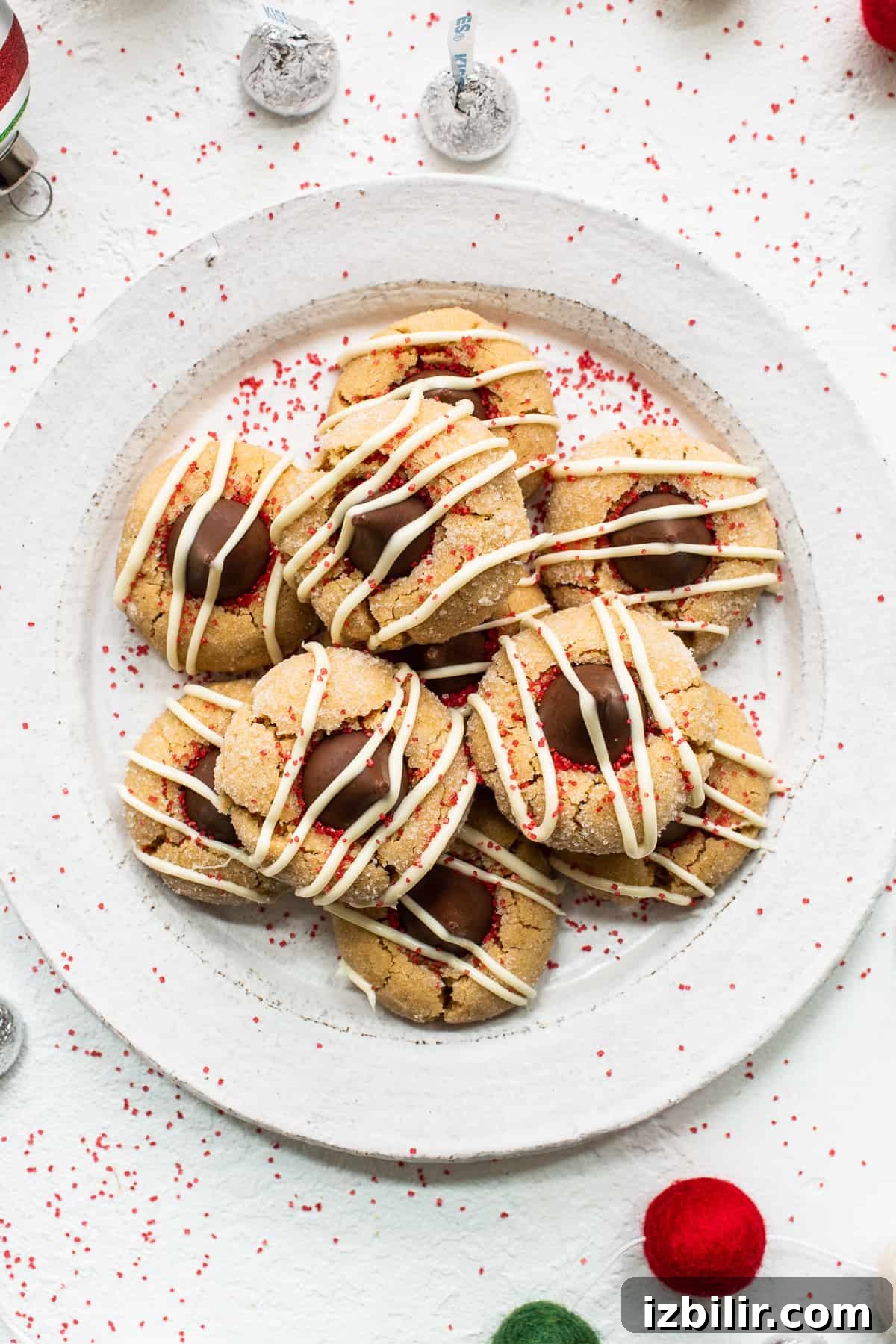 Peanut butter kiss cookies on a plate. Peanut butter kiss cookies on a plate.