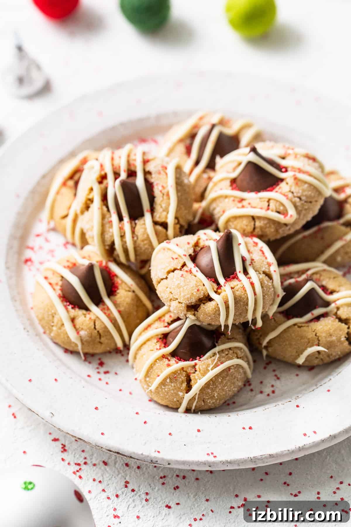 Peanut butter kiss cookies on a plate. Peanut butter kiss cookies on a plate.