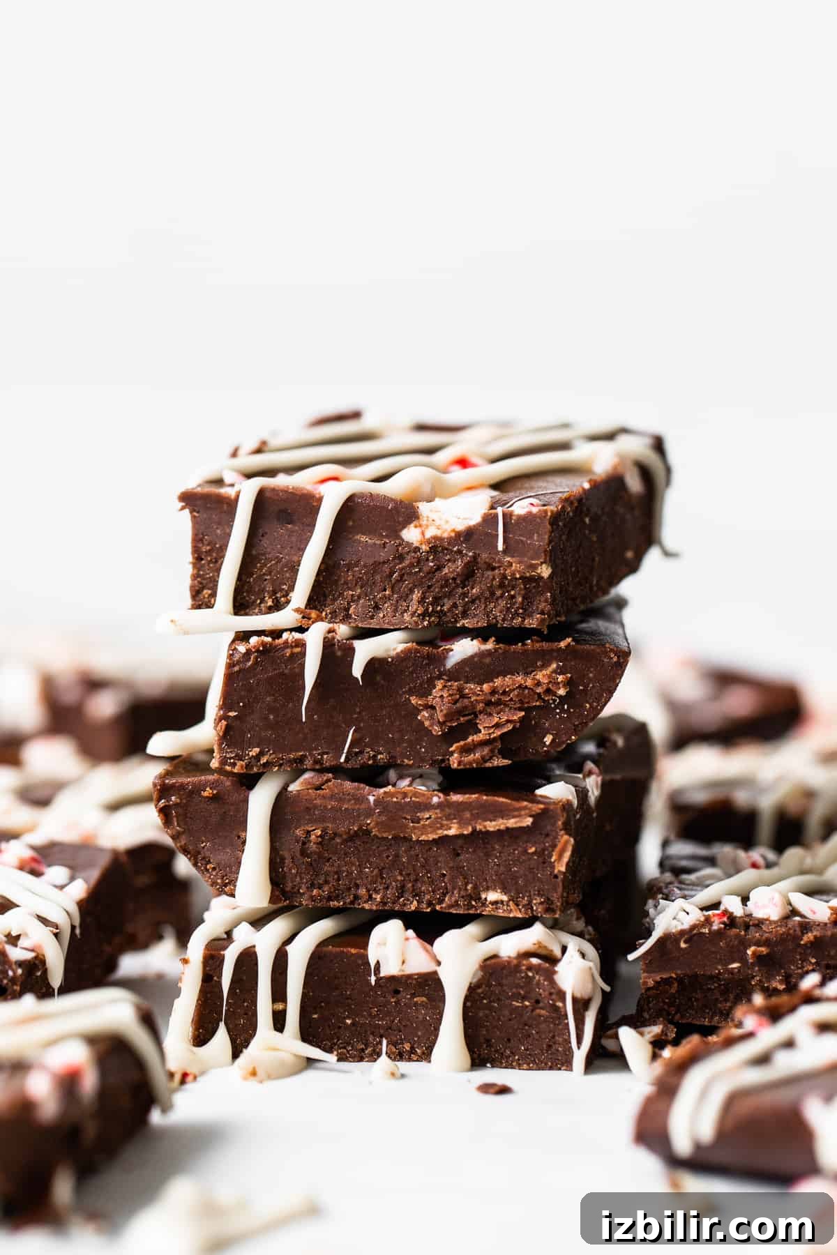 No-Bake Peppermint Freezer Fudge Recipe 2 Stacked fudge pieces.