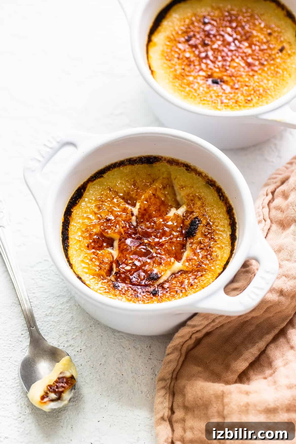 Creamy Eggnog Creme Brulee Recipe 2 Eggnog Creme Brûlée with a cracked top.