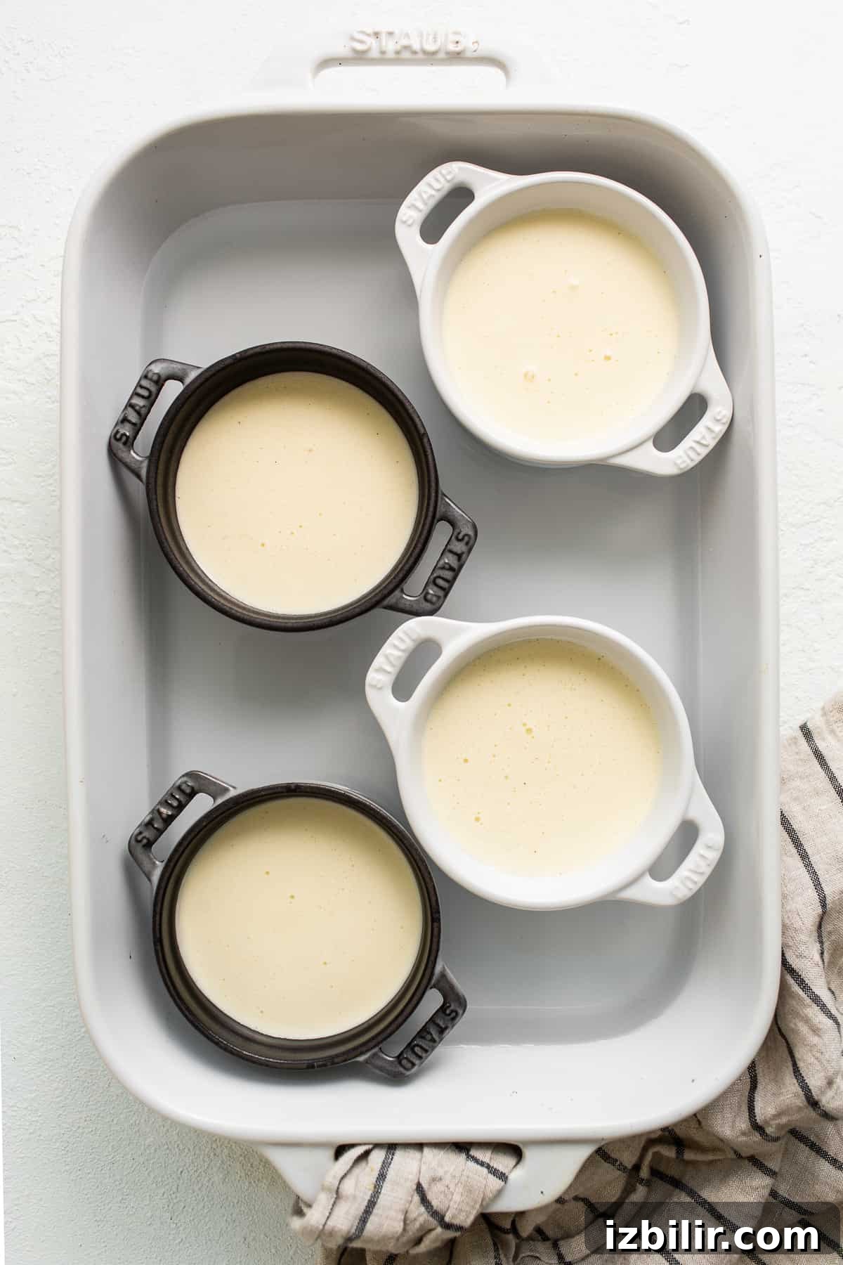 Creamy Eggnog Creme Brulee Recipe 5 Ice cream mixture in ramekins.