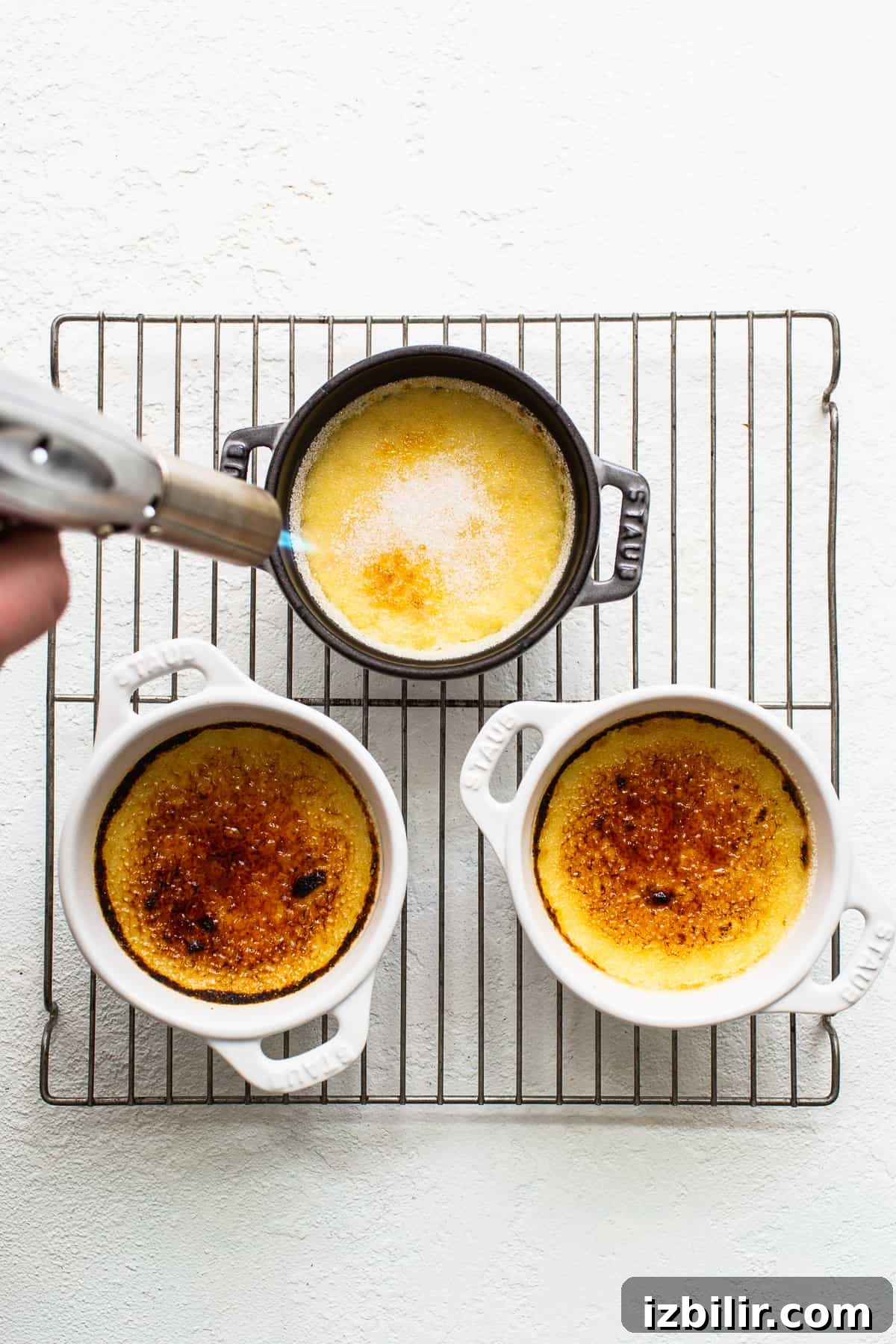 Creamy Eggnog Creme Brulee Recipe 6 Torching the top of the Eggnog Creme Brûlée.
