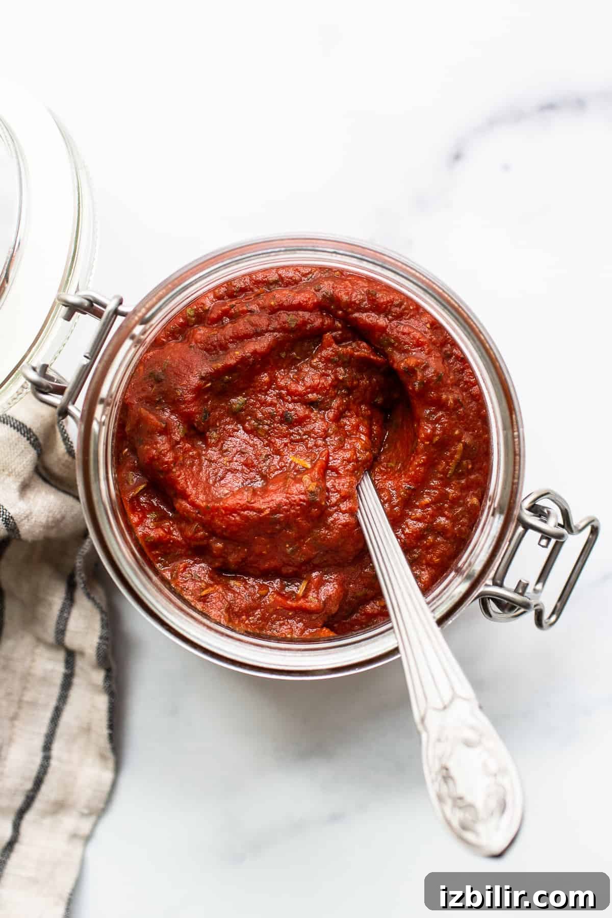 Homemade pizza sauce in a jar.
