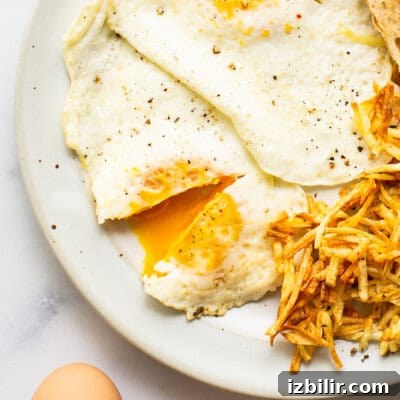15+ Egg Breakfast Recipes to Elevate Your Morning 5 A plate with eggs, potatoes and toast.