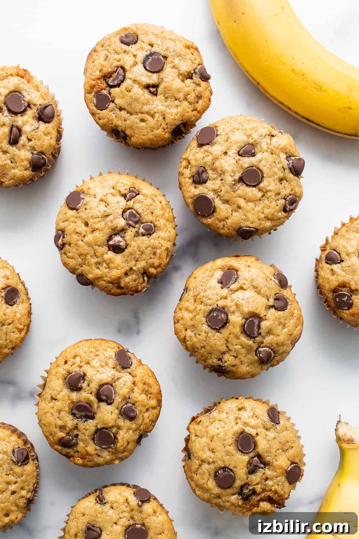 Banana bread muffins on a table.