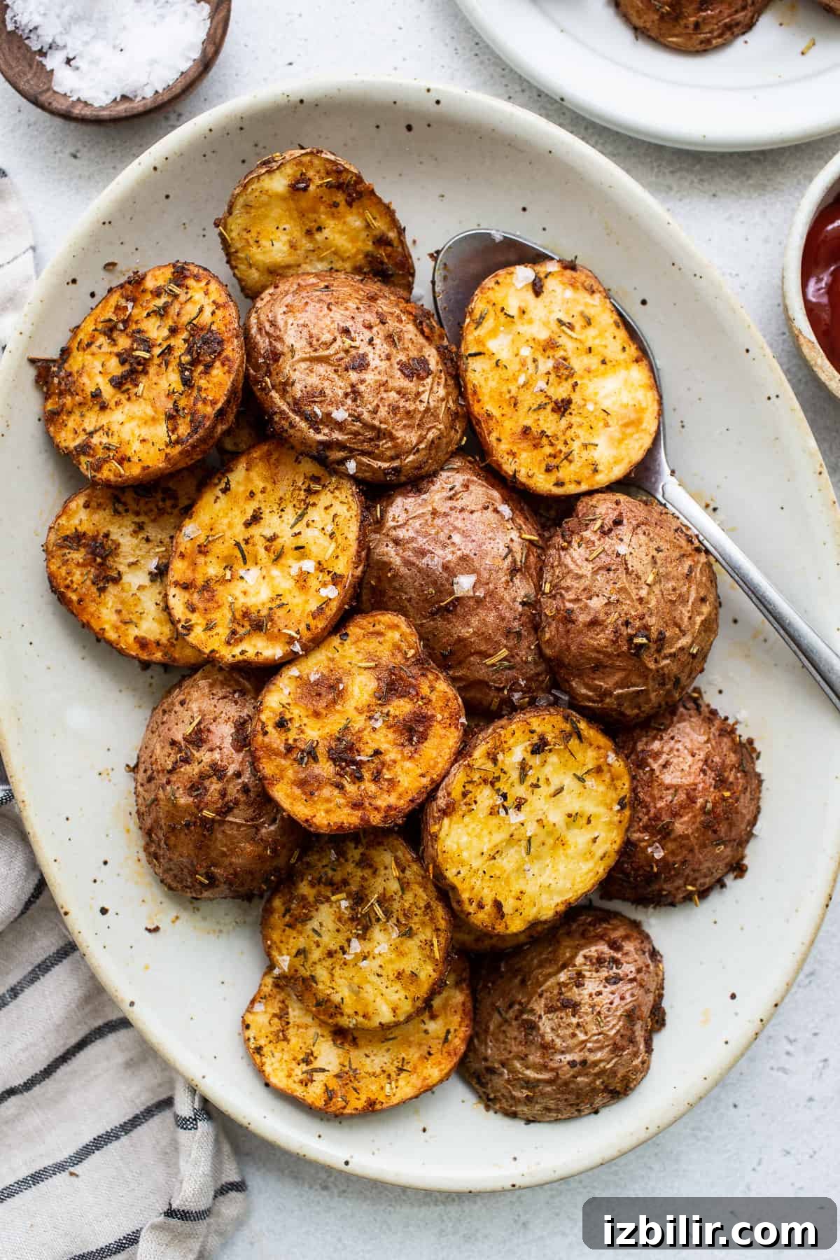 Crispy air fryer potatoes on a plate.