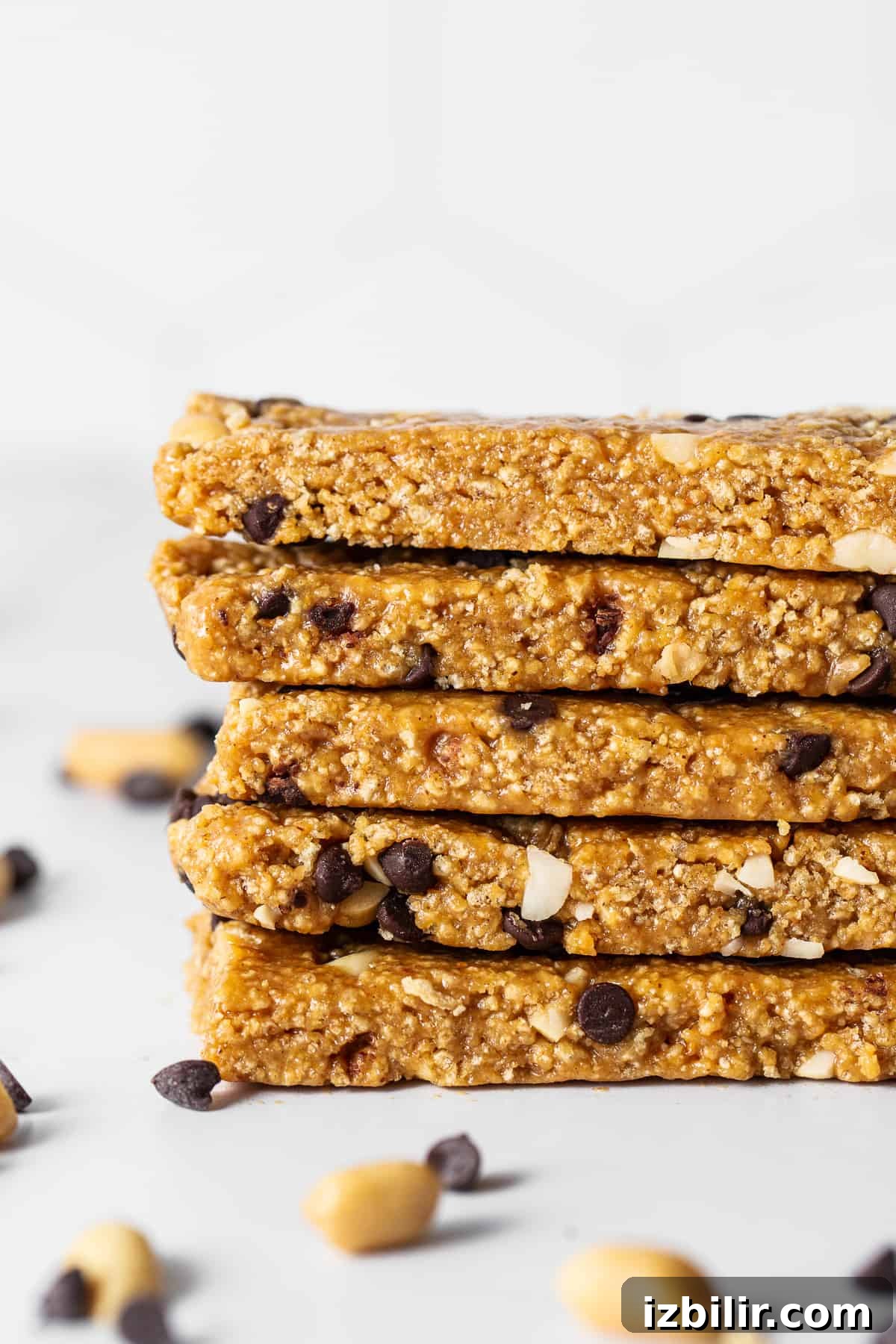Stacked no-bake peanut butter bars. No bake peanut butter bars stacked on a plate.