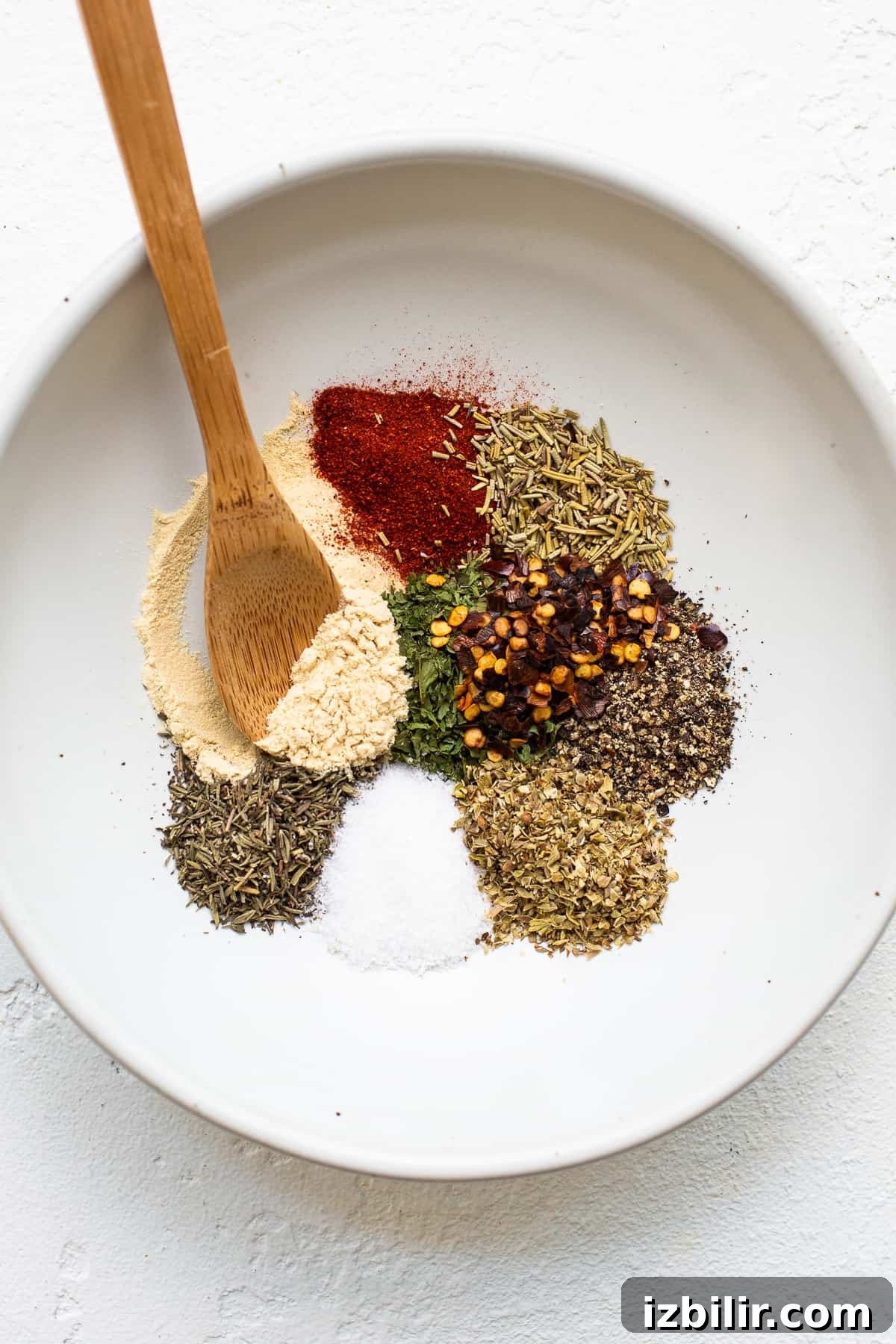 Dried spices for bolognese Dried spices for ground chicken bolognese in a bowl.