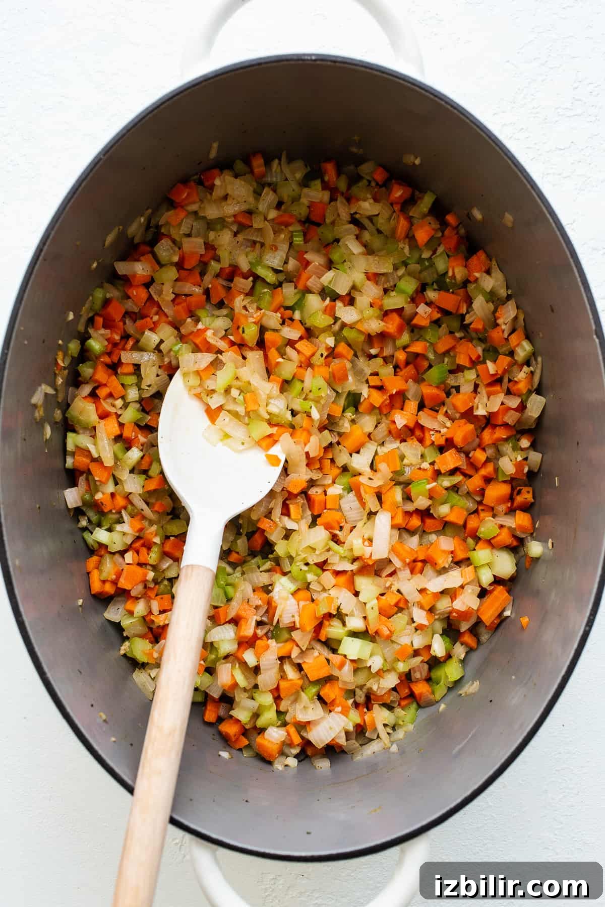 Veggies for the sauce Minced veggies in a stock pot.