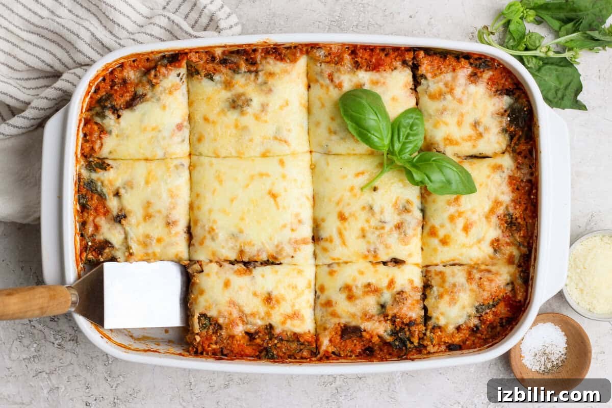Spinach and Quinoa Lasagna Casserole Recipe 2 Overhead view of spinach quinoa lasagna casserole cut into squares in a baking dish