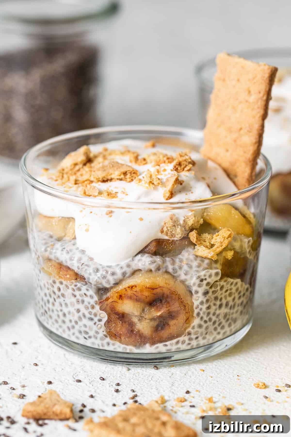 This banana cream pie chia seed pudding is creamy, sweet, and packed with yummy banana flavor! Banana cream pie chia seed pudding in a glass.