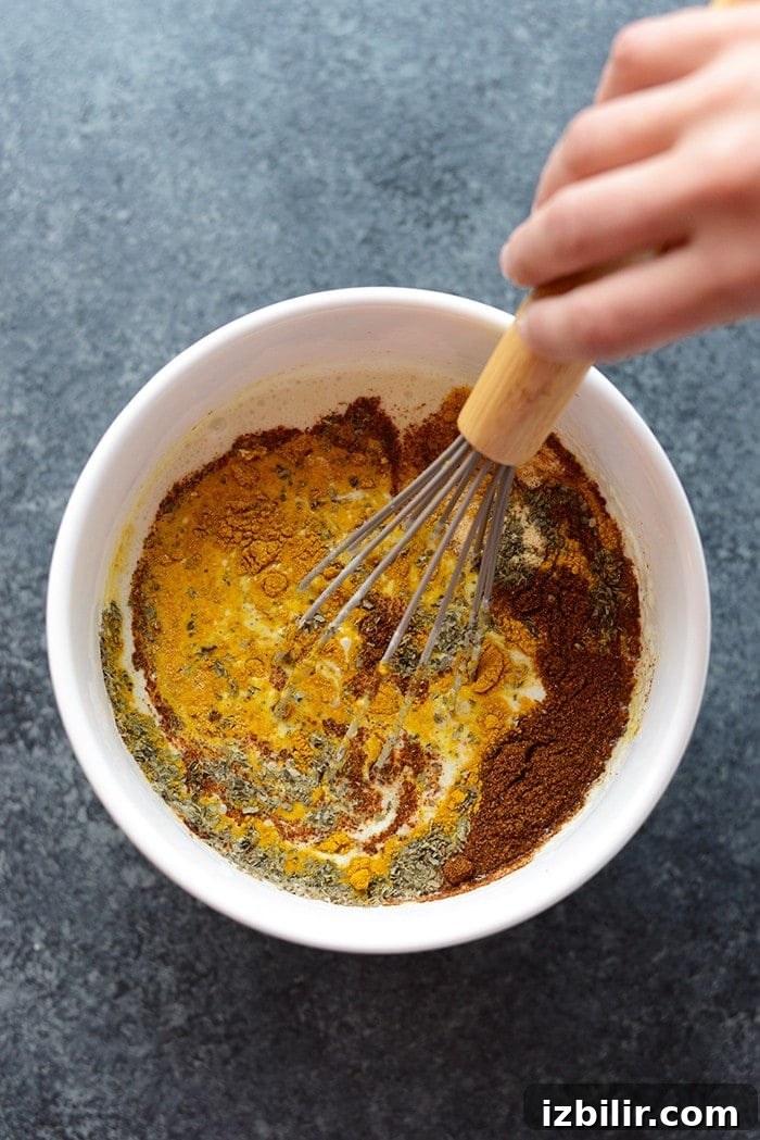 Baked Sweet Potato Green Curry Quinoa Casserole 6 Serving of green curry quinoa casserole on a plate