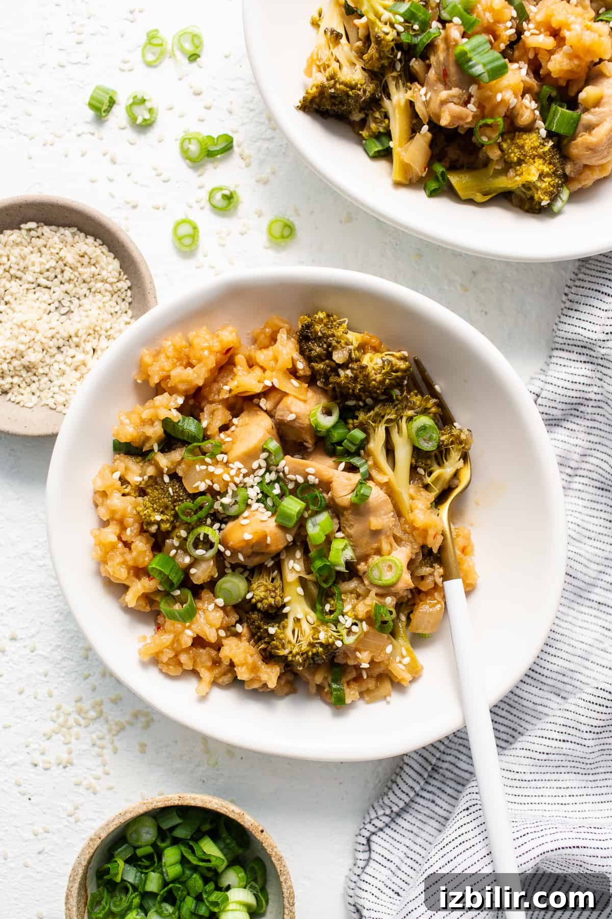 orange chicken casserole in bowl.