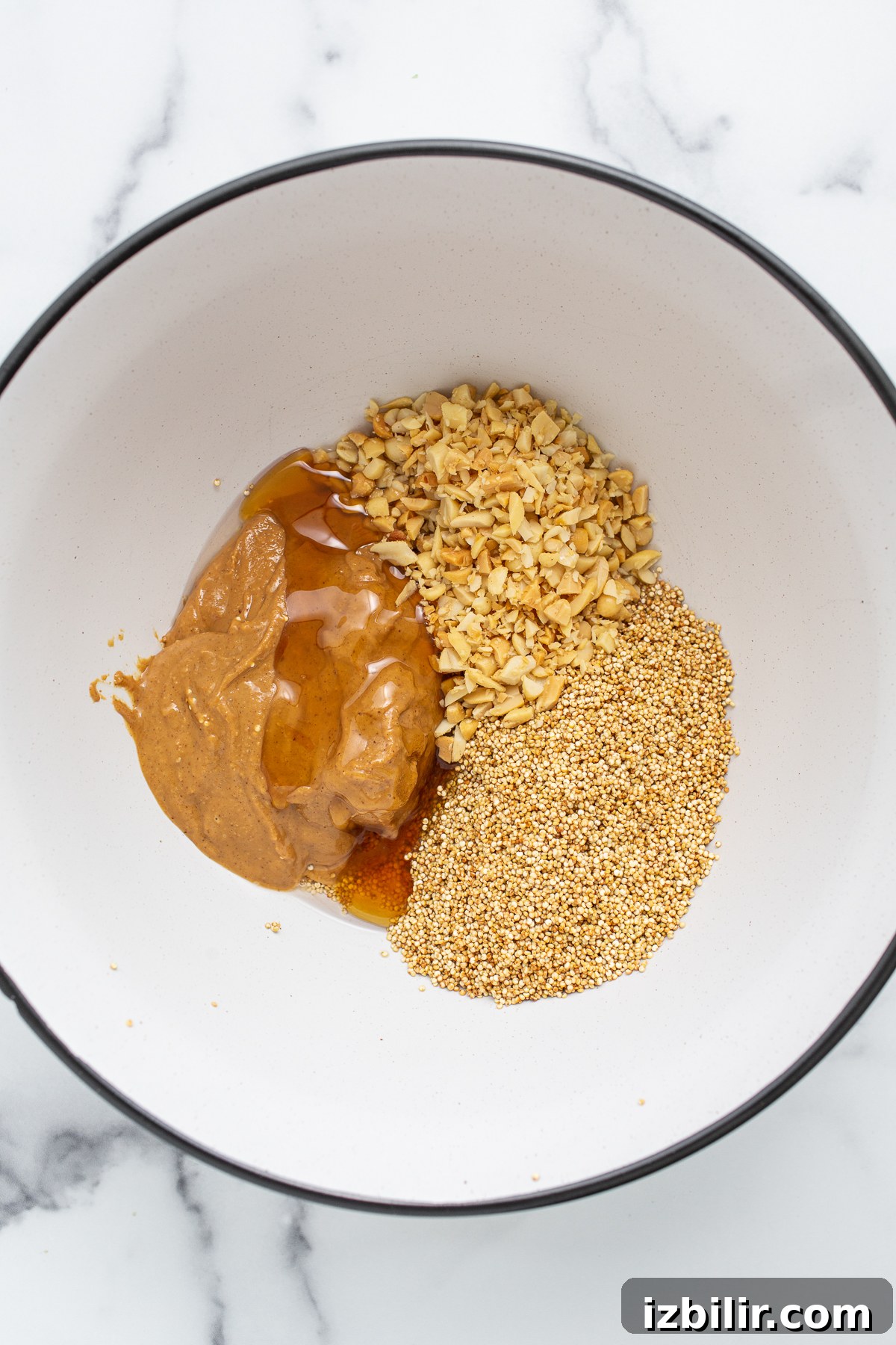 Peanut Butter and Jelly Quinoa Cups Recipe 3 All of the ingredients in a bowl.