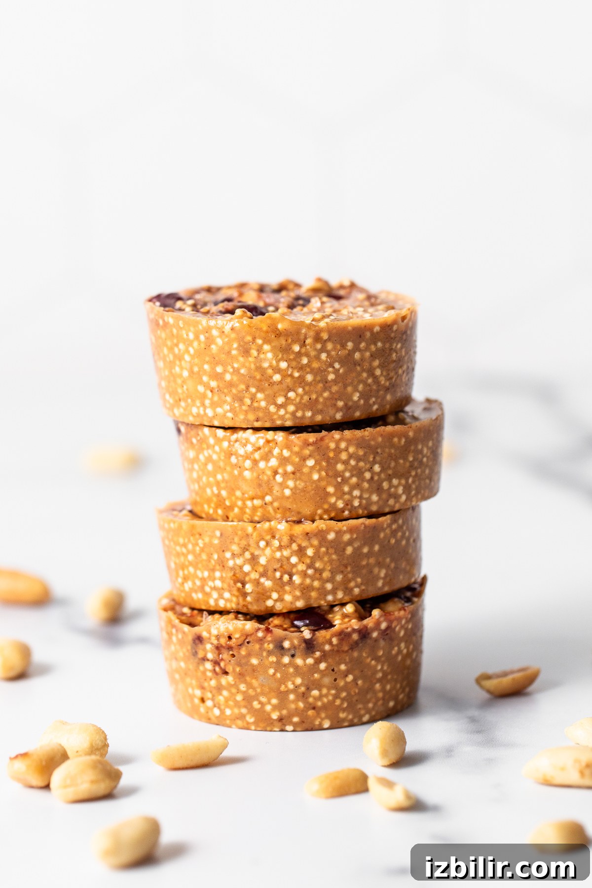 Peanut Butter and Jelly Quinoa Cups Recipe 6 Stacked peanut butter and jelly cups.