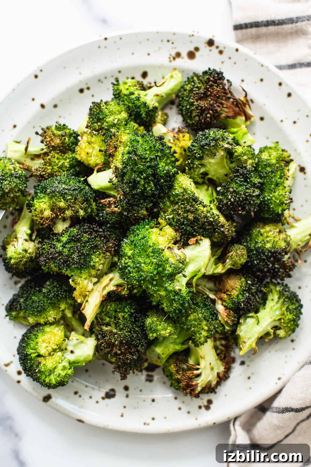 Air fryer broccoli on a plate.
