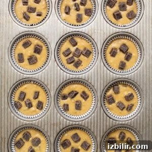 Muffins in a tin ready to bake