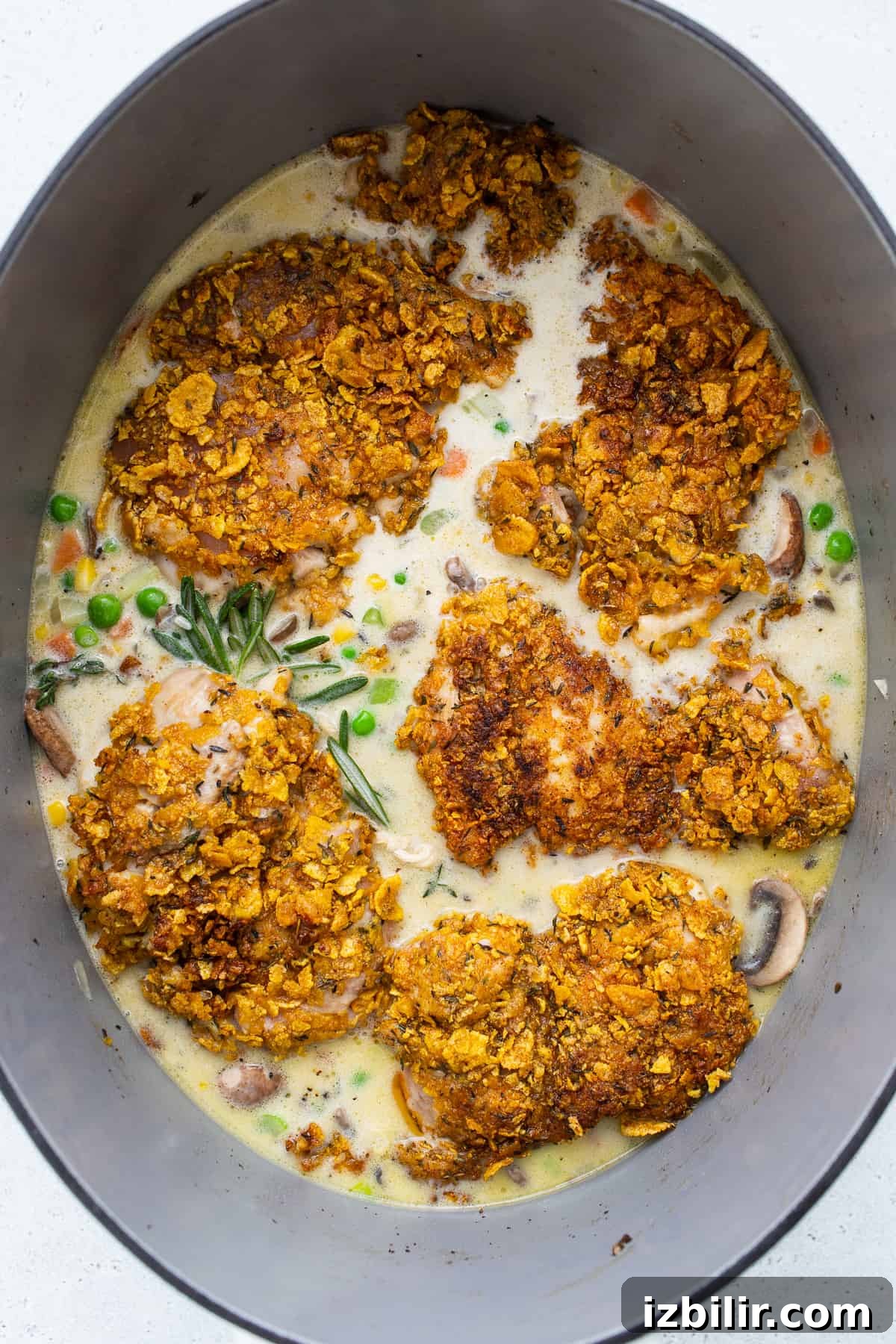 Chicken pot pie skillet ready to bake.