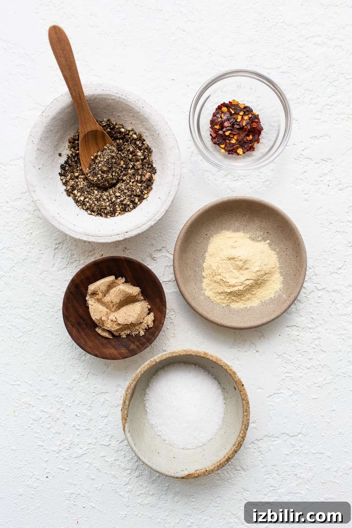 Homemade steak seasoning ingredients Steak seasoning ingredients in bowls.