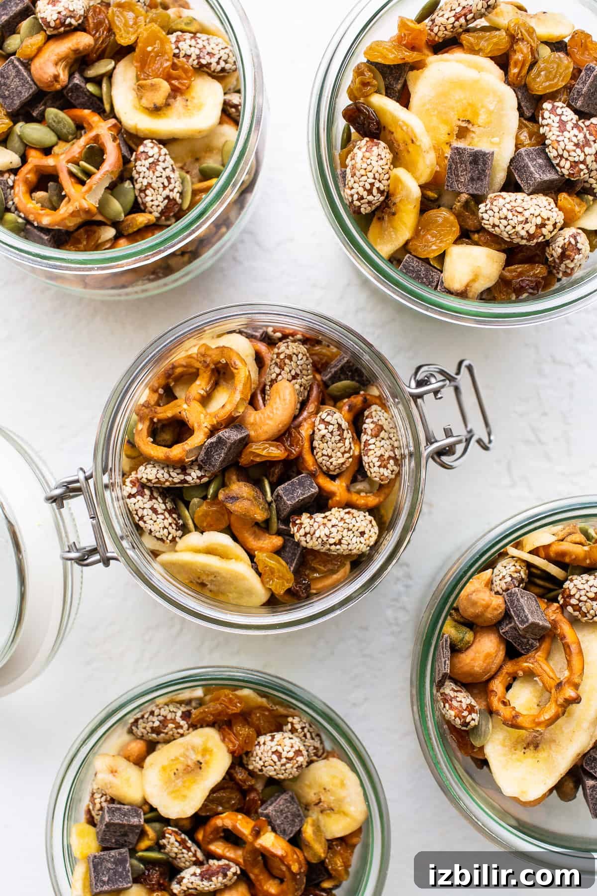 Homemade trail mix in mason jars.