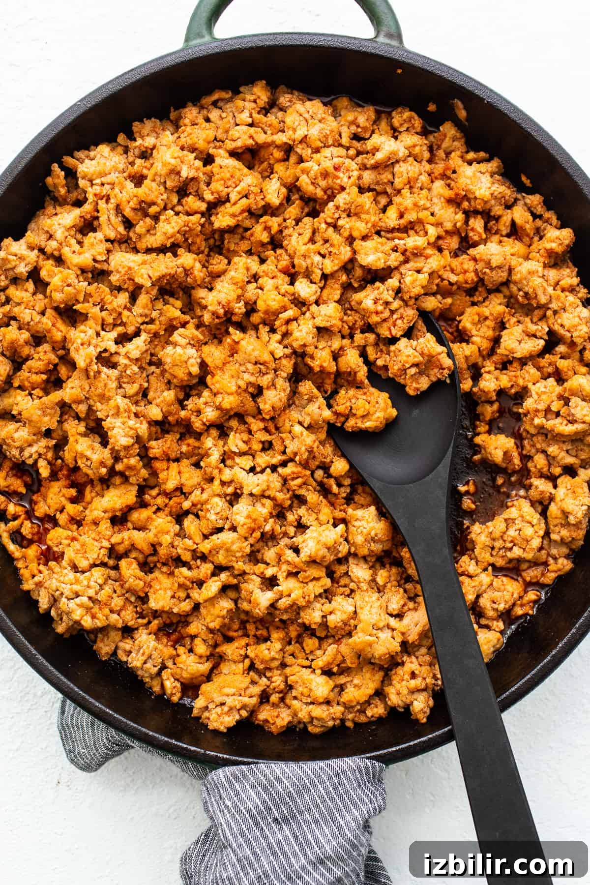 Spicy Gochujang Ground Chicken Bowl Recipe 5 A spoon with ground chicken.