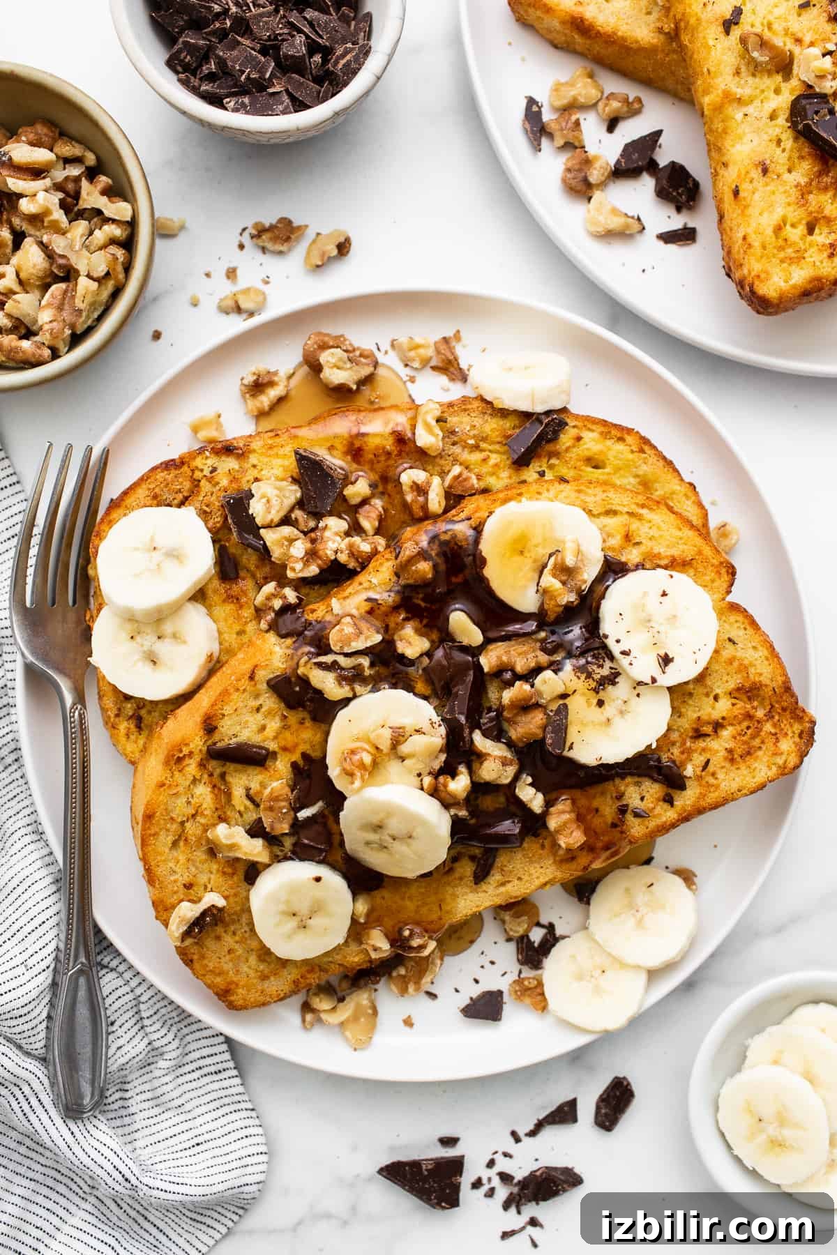 Air fryer chunky monkey french toast on a plate.