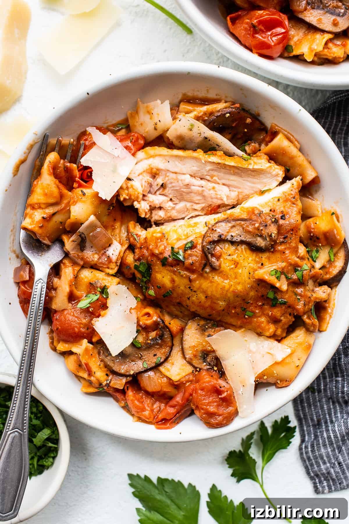 One-pot pappardelle with chicken One pot pappardelle with chicken thighs in a bowl.