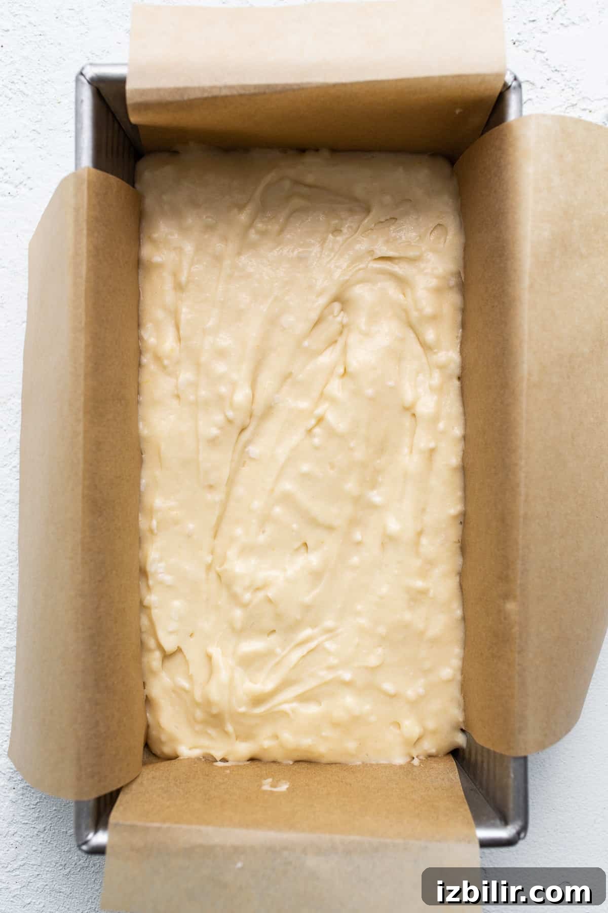 cake batter in loaf pan.