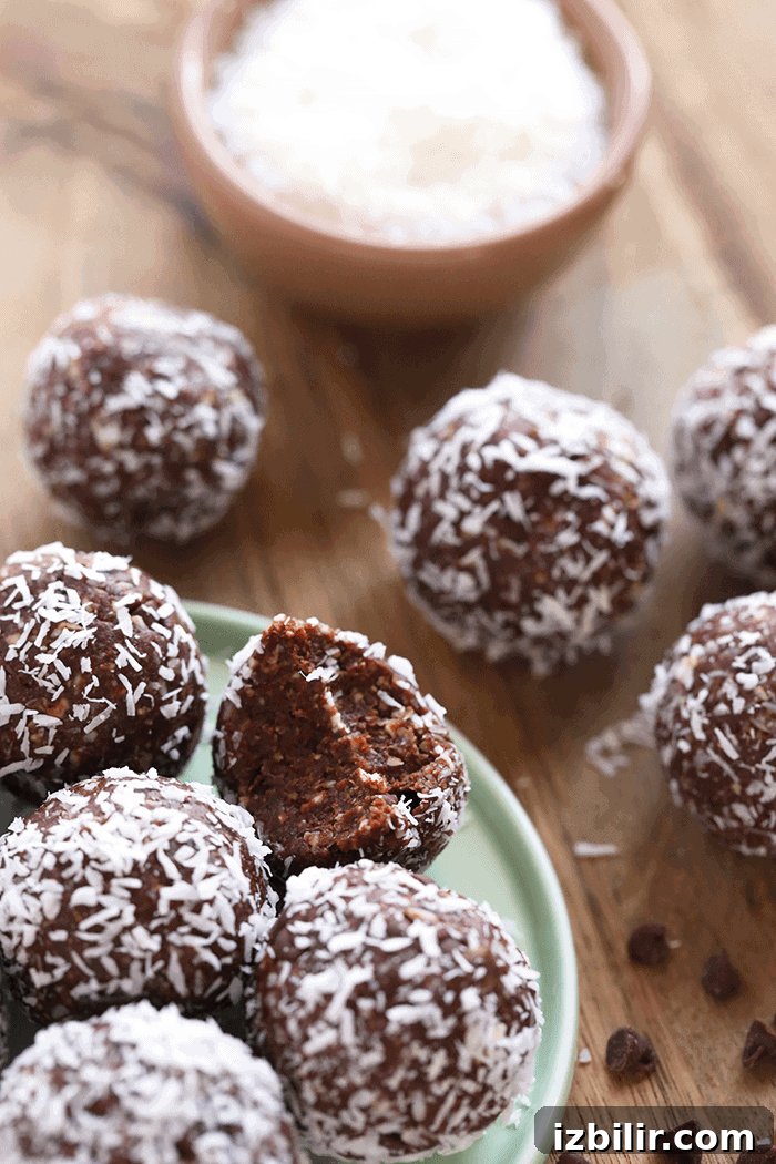 Coconut chocolate energy balls on a plate No bake energy balls on a plate
