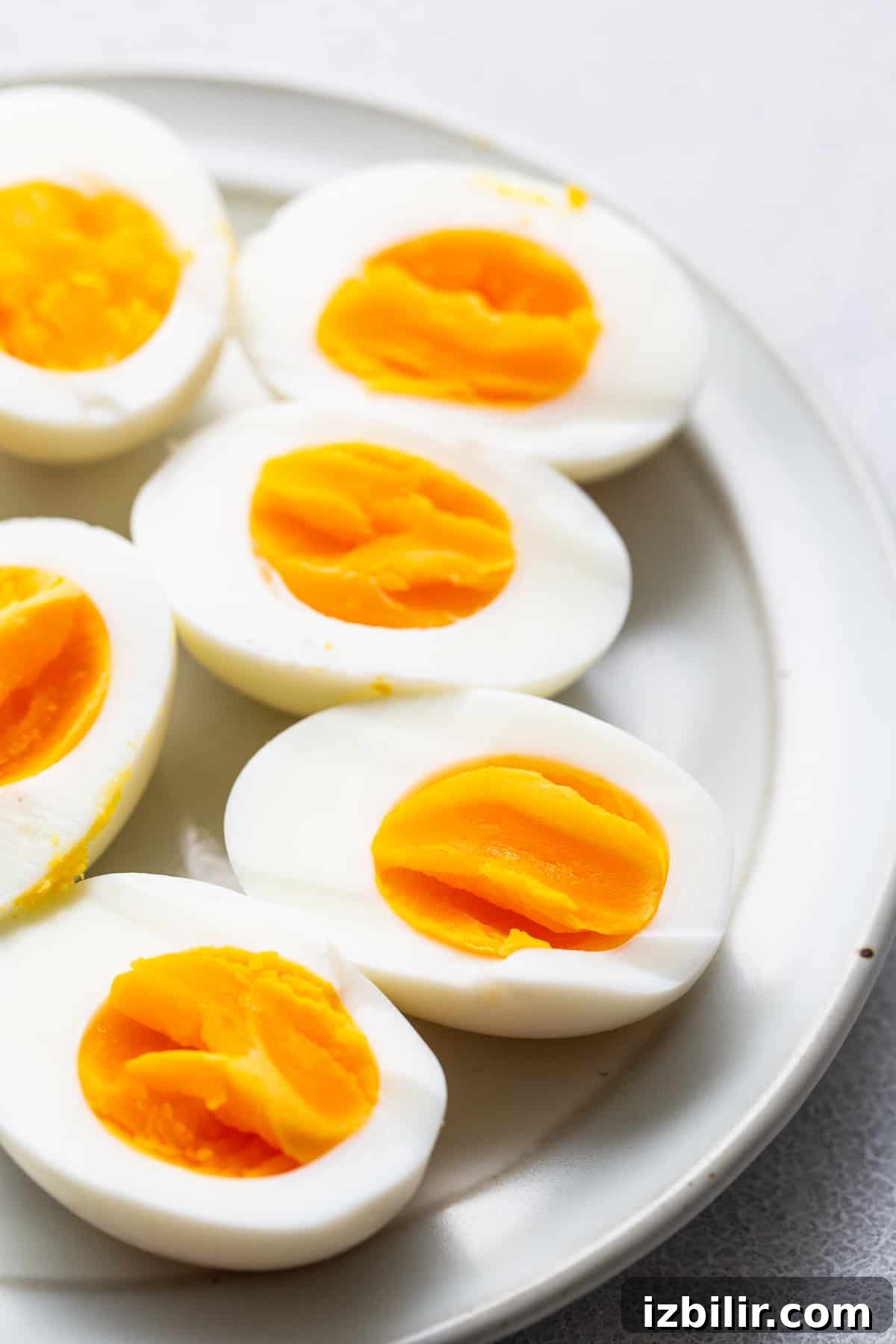 Air fryer hard boiled eggs on a plate.