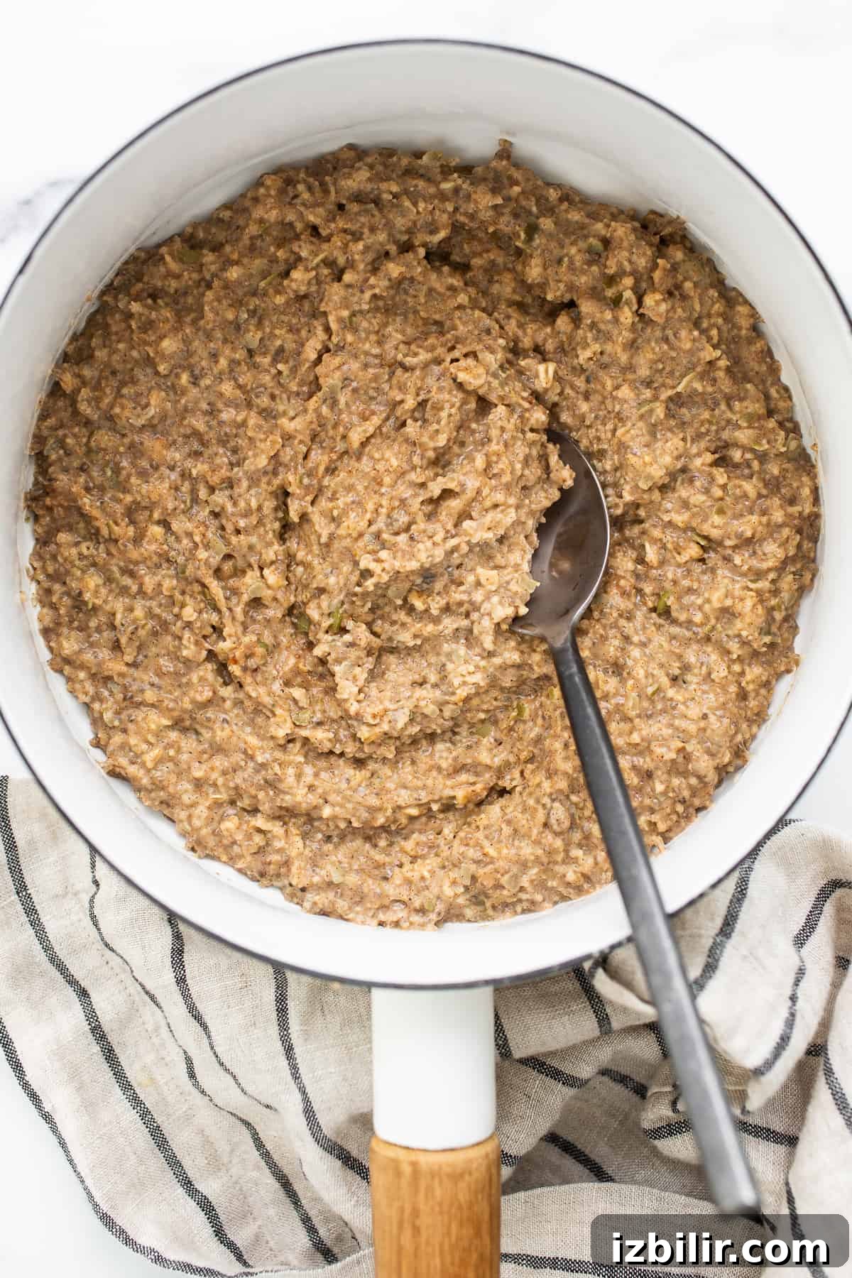 Cooked porridge in a saucepan.