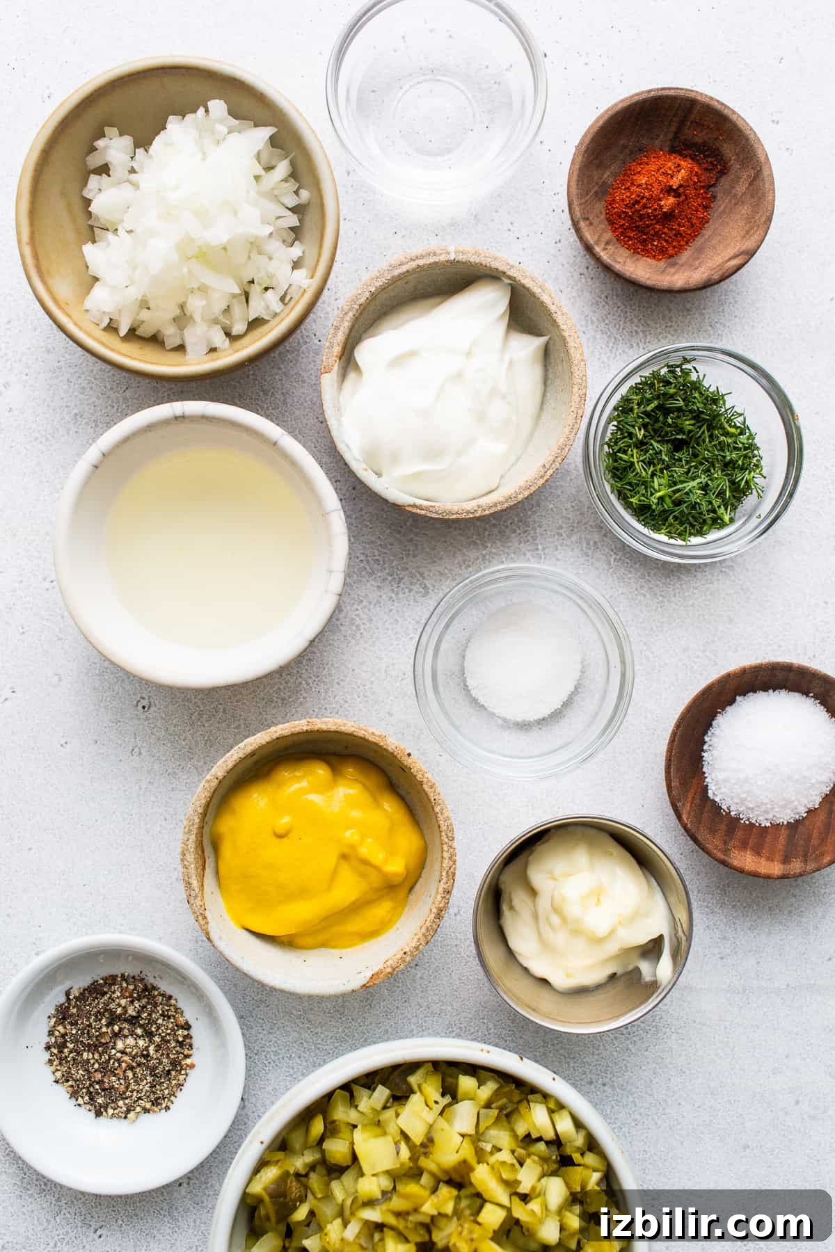 Ingredients for deviled egg salad in bowls.