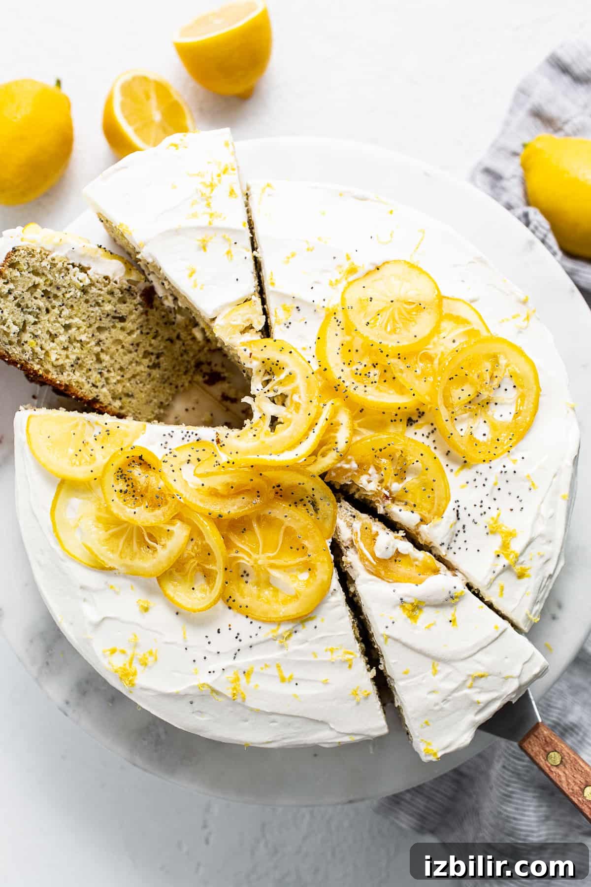 Lemon poppy seed cake on a cake plate.